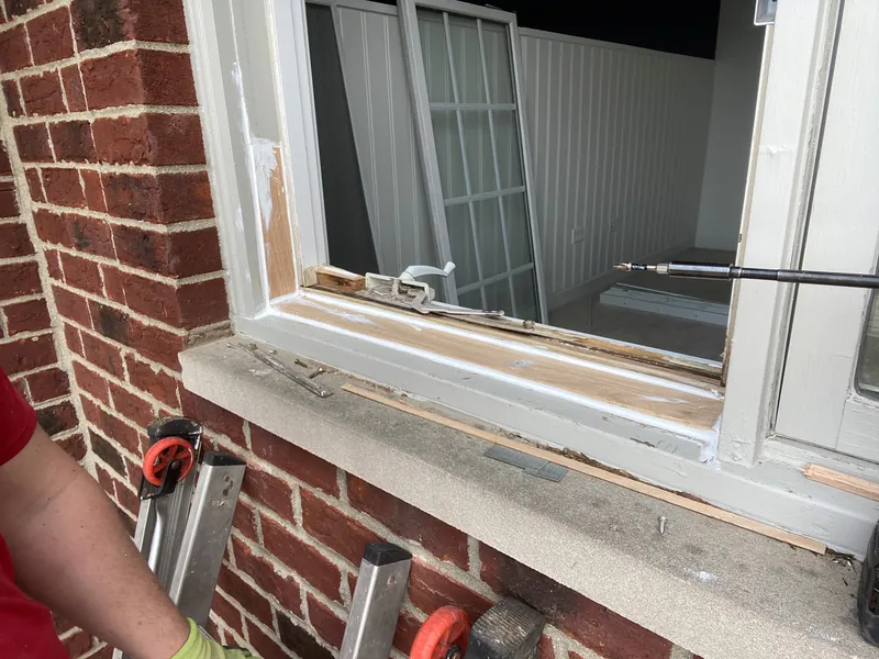 New wood spliced into the window sill during the rot repair