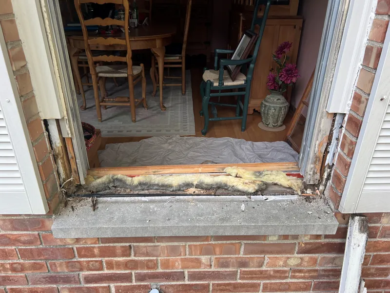 Rotted window sill removed down to the framing before rebuilding