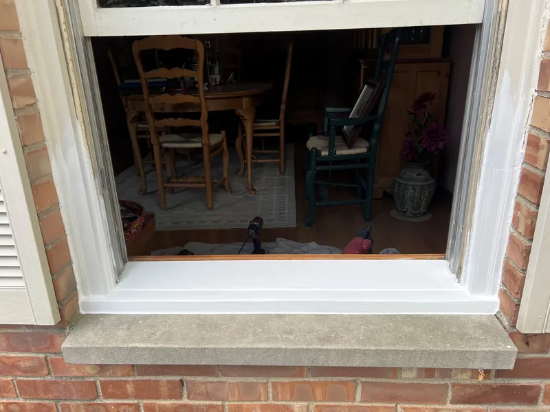 Rebuilt and painted window sill after repair